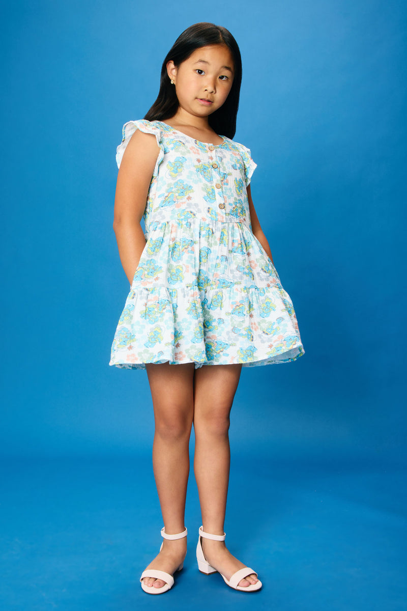 GS0044 Blue Smurfs All Over Printed Flutter Sleeve Gauze Romper Pose