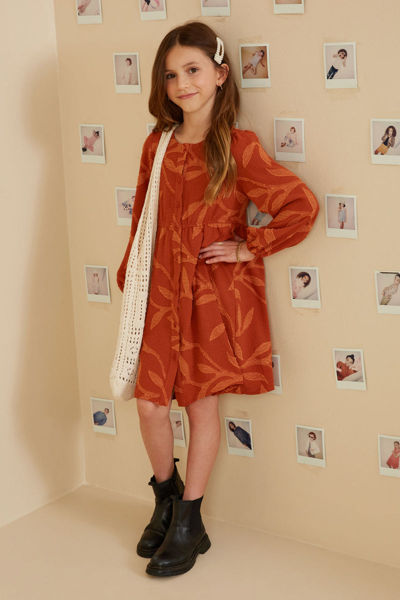 GY8379 Rust Girls Textured Tonal Botanical Print Button Up Dress Pose