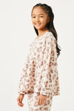 GDY2907 Leopard Girls Brushed Knit Leopard Peplum Top Pose