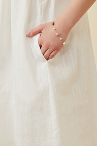 GK1375 Off White Girls Textured Lace Trim Ruffle Sleeve Dress Detail