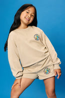 GS0040 Tan Smurfs All You Need is Love Graphic Garment Washed Sweatshirt Pose