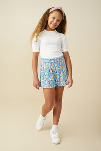 GS0055 Blue Smurfs All Over Love Printed Textured Smocked Shorts Pose