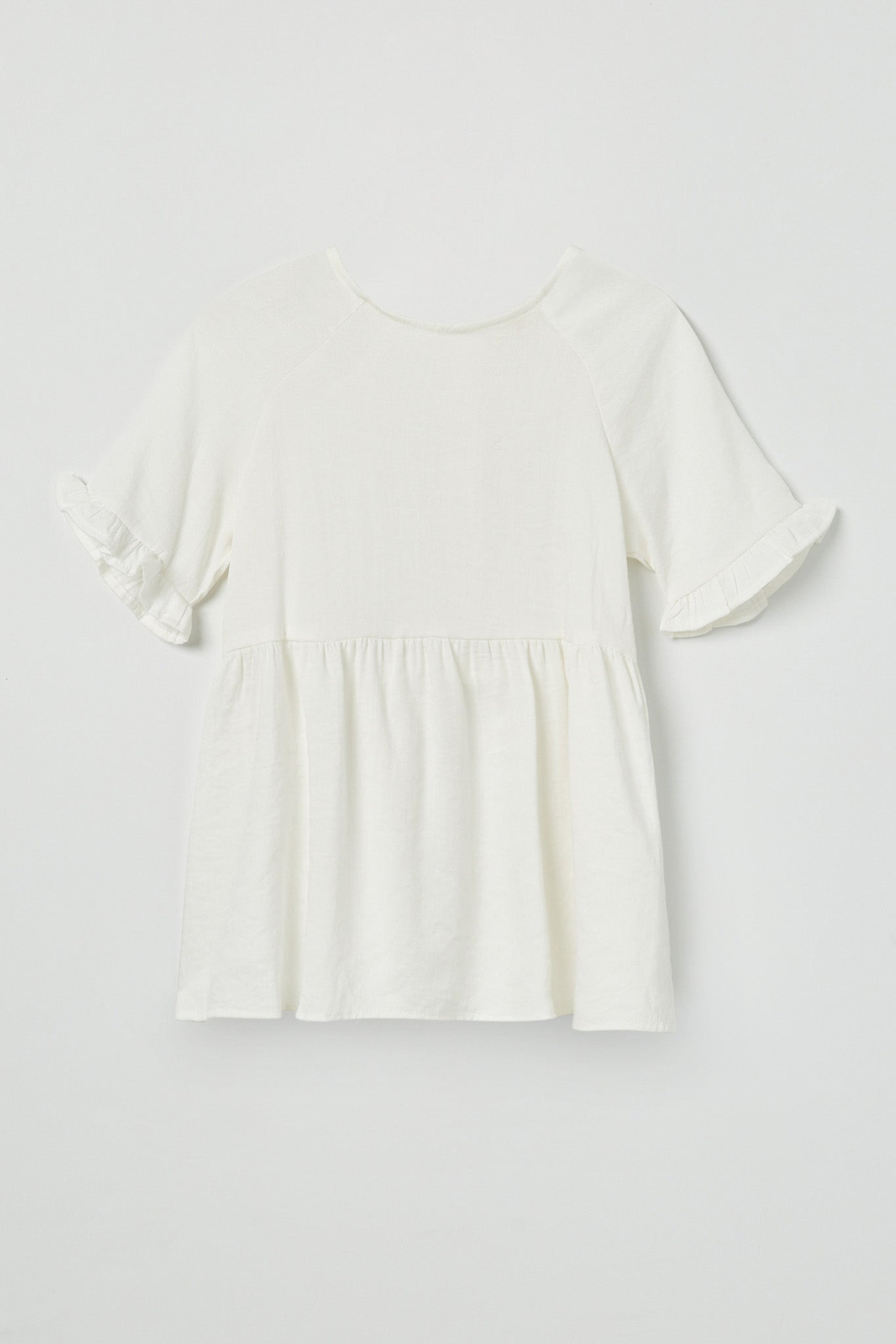 GY2509 Off White Girls Ruffle Sleeve Button Back Peplum Top Flat Front