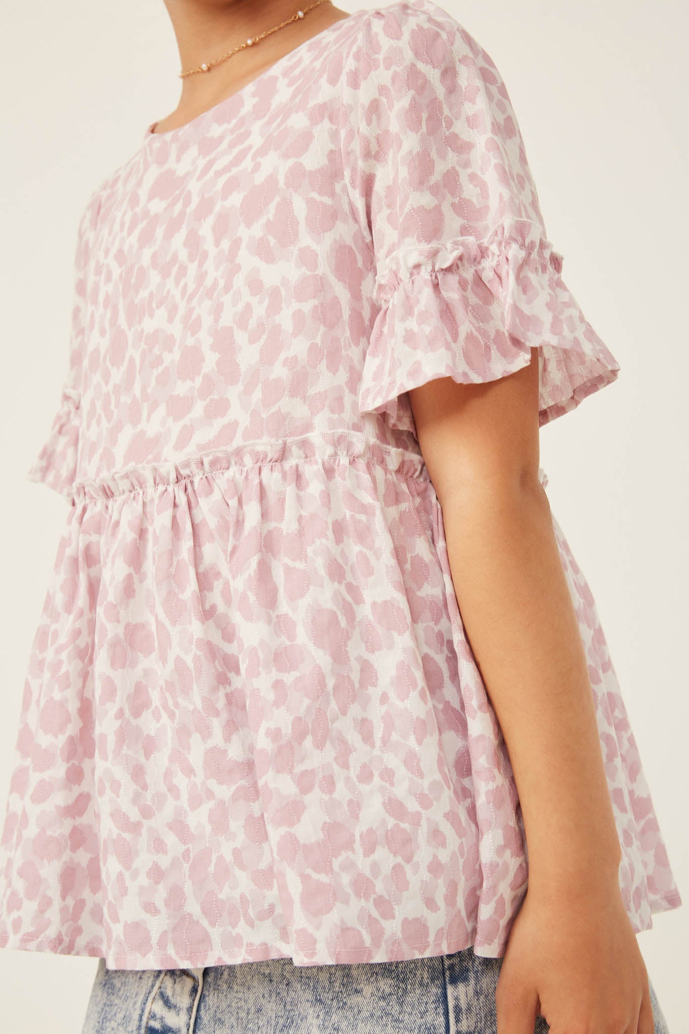 Abstract Animal Print Ruffled Peplum Top