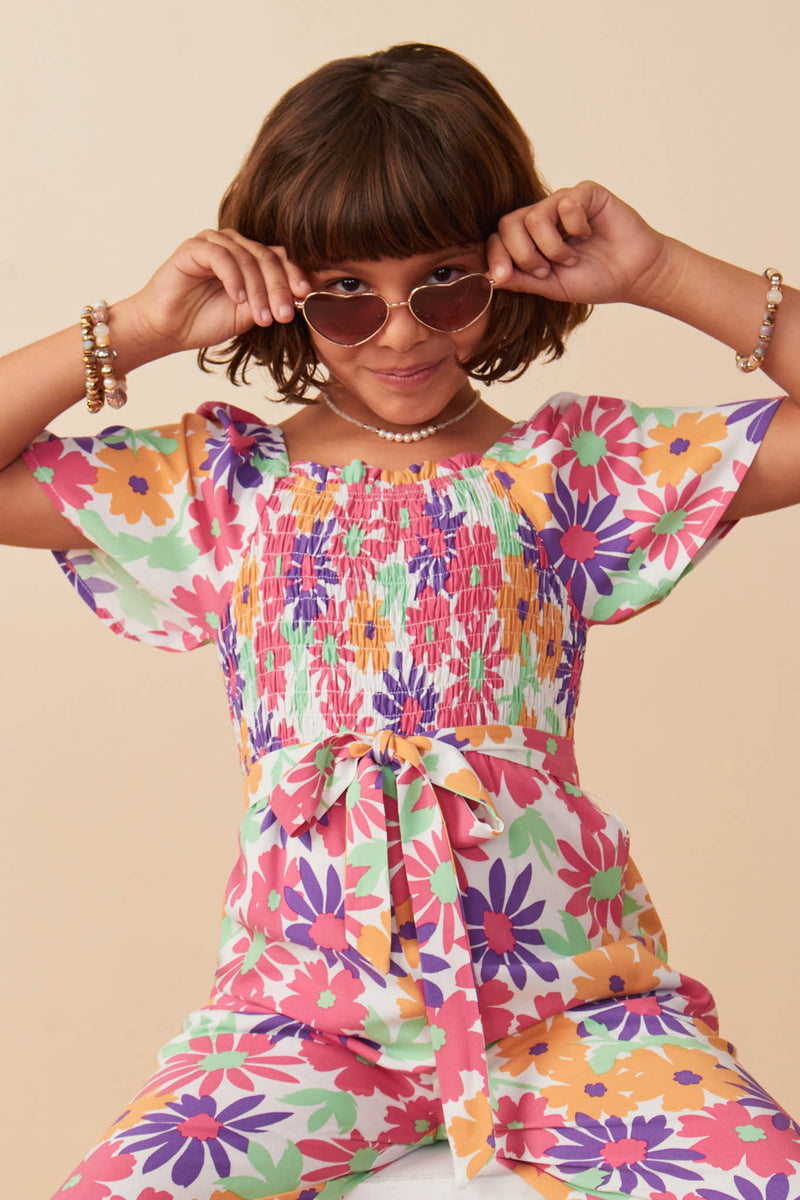 GY8032 Off White Girls Vivid Floral Self Belt Smocked Jumpsuit Pose