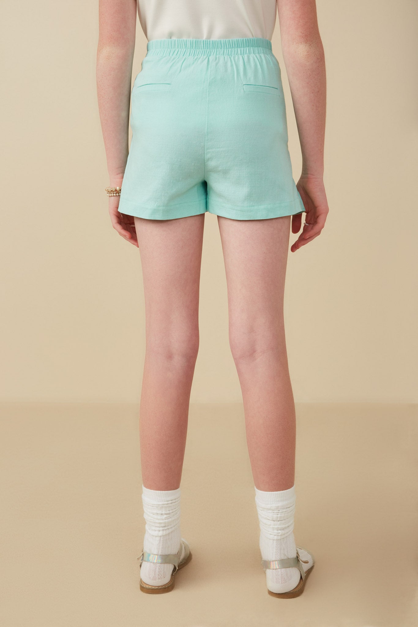 GY8283 Sky Girls Asymmetric Ruffled Hem Skort Back