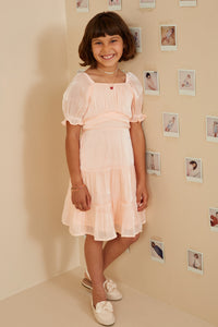 GY8623 Peach Girls Textured Shimmer Tie Detail Dress Pose