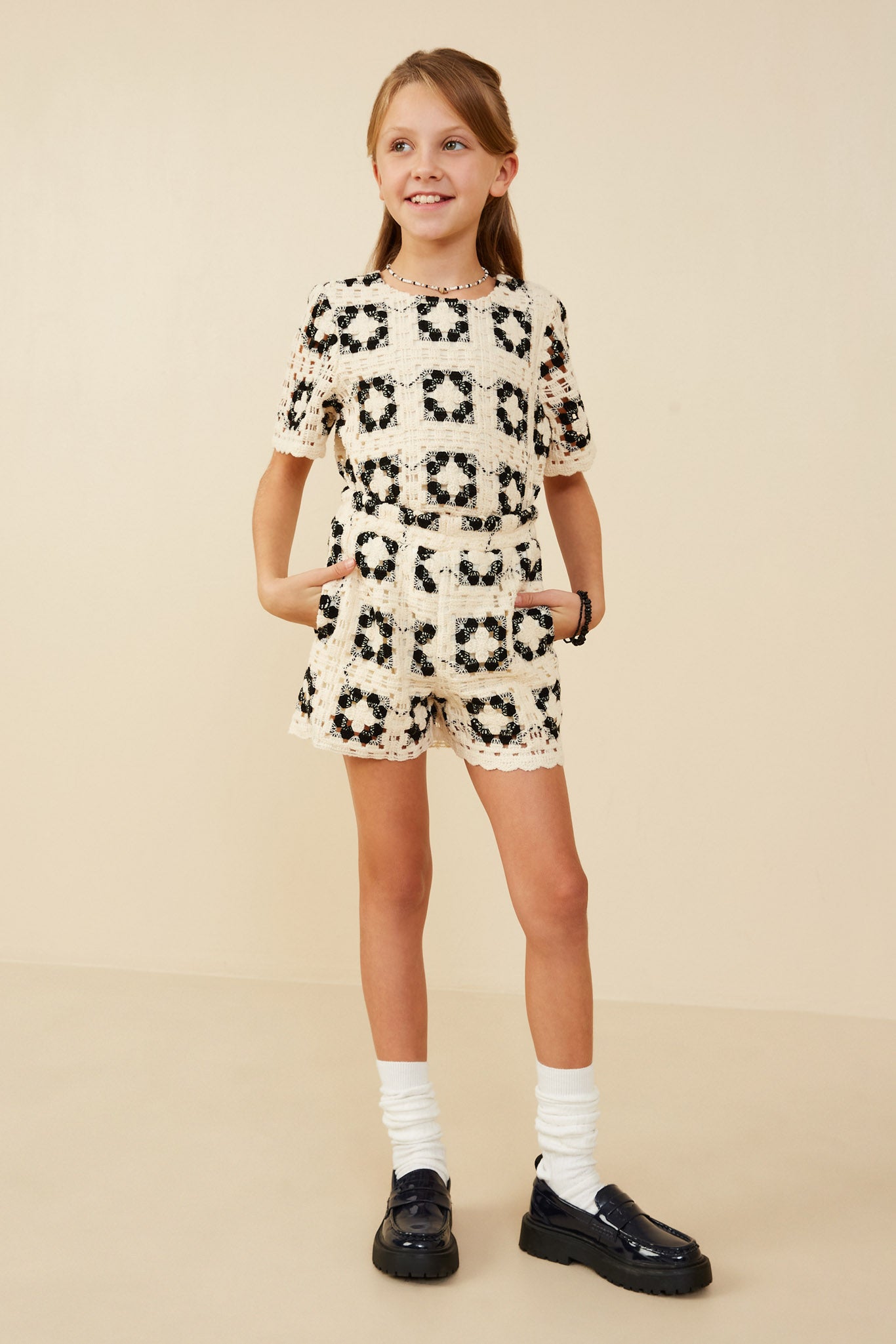 GY8913 Oatmeal Girls Quilted Crochet Elastic Waist Shorts Pose