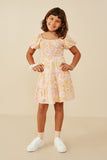 GY9191 Pink Girls Textured Floral Smocked Detail Puff Sleeve Dress Pose