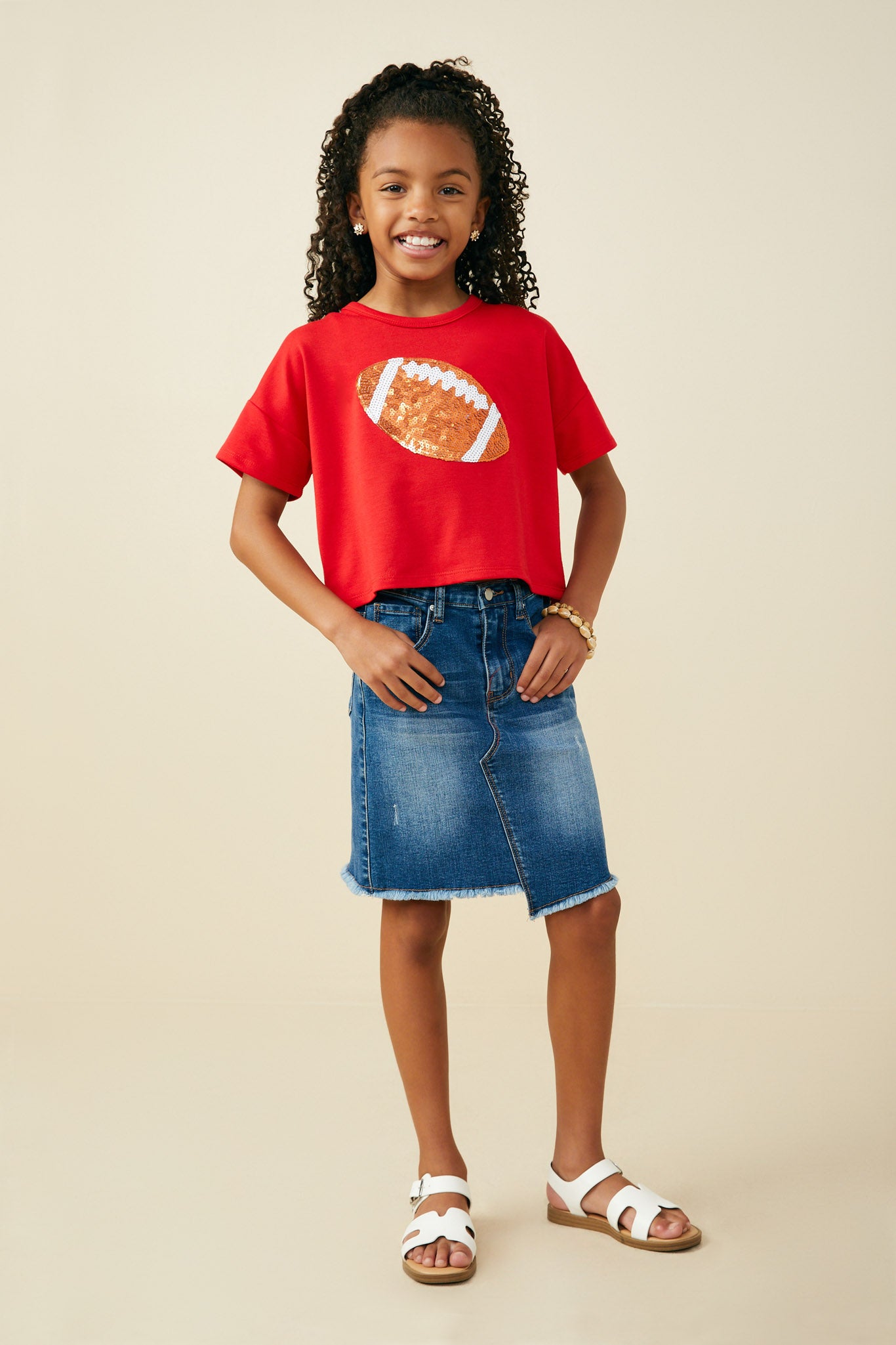 GY9582 Red Girls Gameday Sequin Football Patched T Shirt Pose
