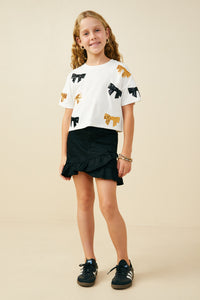 GY9583 Black Girls Gameday Team Color Sequin Bow Patched T Shirt Pose