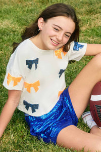 GY9583 Orange Girls Gameday Team Color Sequin Bow Patched T Shirt Editorial