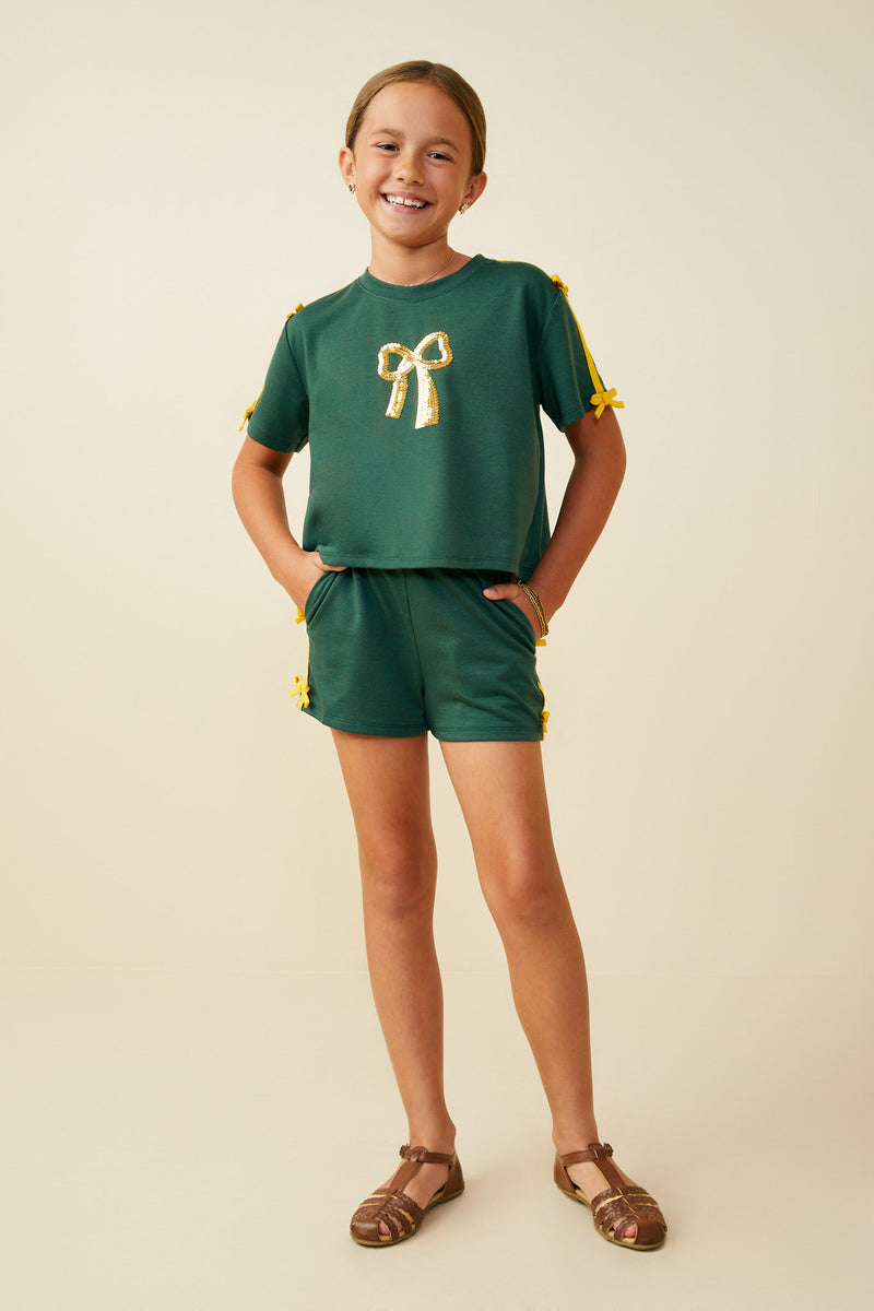 GY9585 Green Girls Sequin Bow Patch Ribbon Detail Knit Top Pose