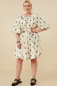 HY8870W Ivory Womens All Over Bow Print Belted Dress Pose