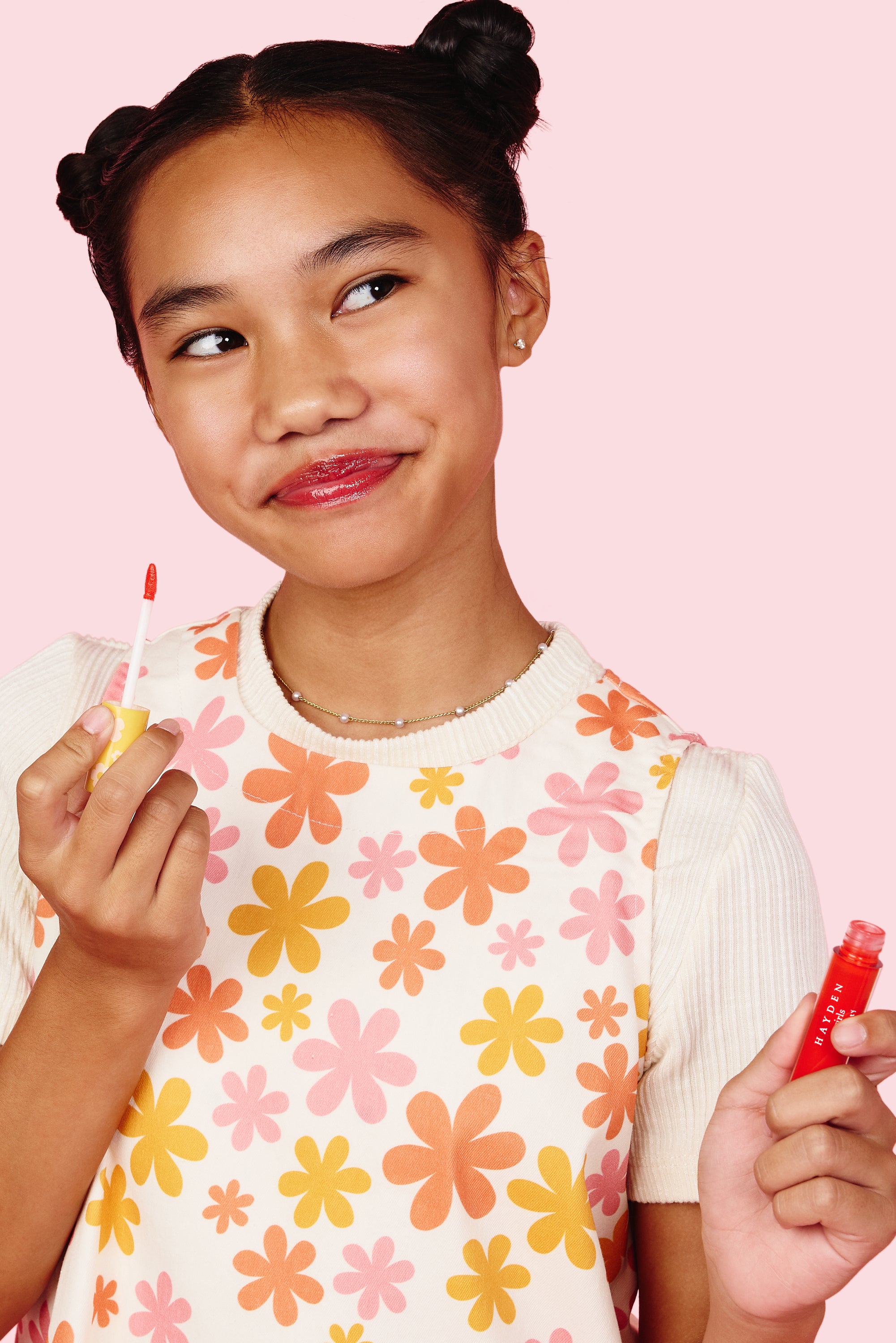 LPG001 Coral Berry Hayden Girls Beauty Hydrating Glossy Lip Gloss Product in Hand