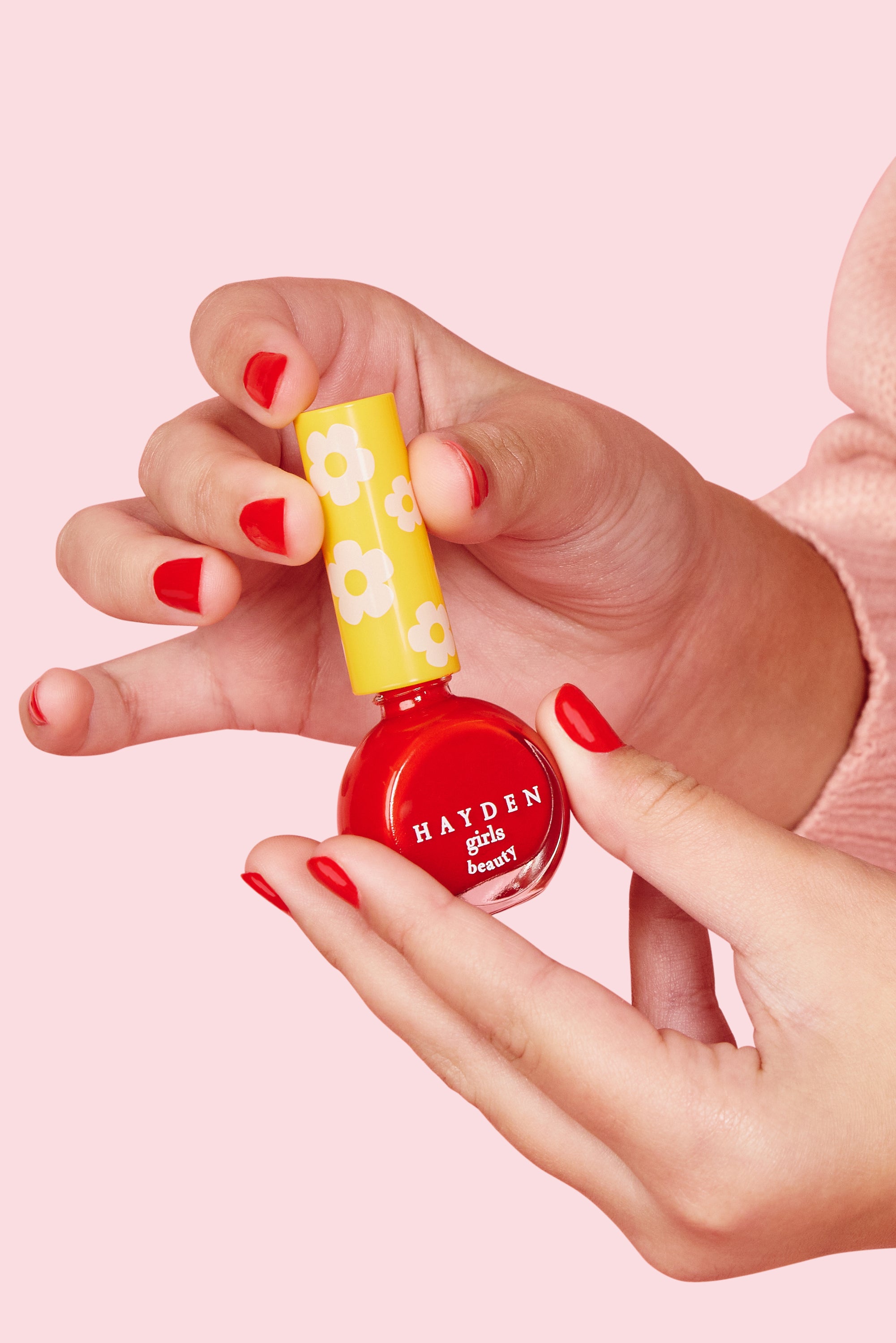 NPG001 Cherry Glow Hayden Girls Beauty Water Based Dazzling Nail Polish Angled Shot