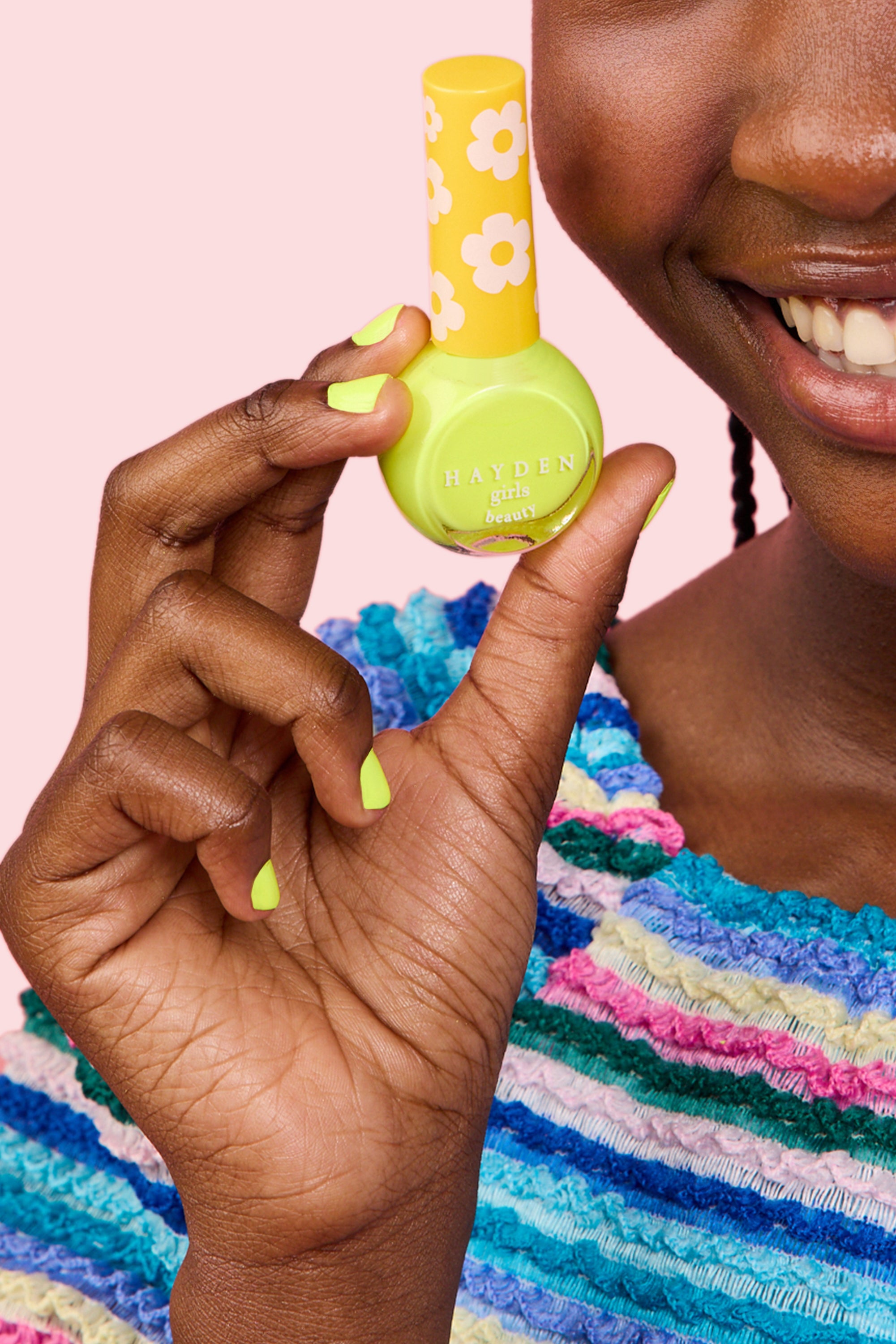 NPG001 Lemon Glow Hayden Girls Beauty Water Based Dazzling Nail Polish Product in Hand